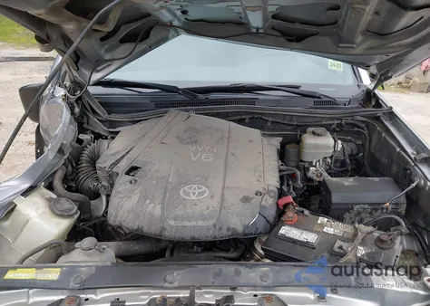 2014 Toyota Tacoma Base V6 z USA, uszkodzony, nr VIN 5TFUU4EN4EX087353